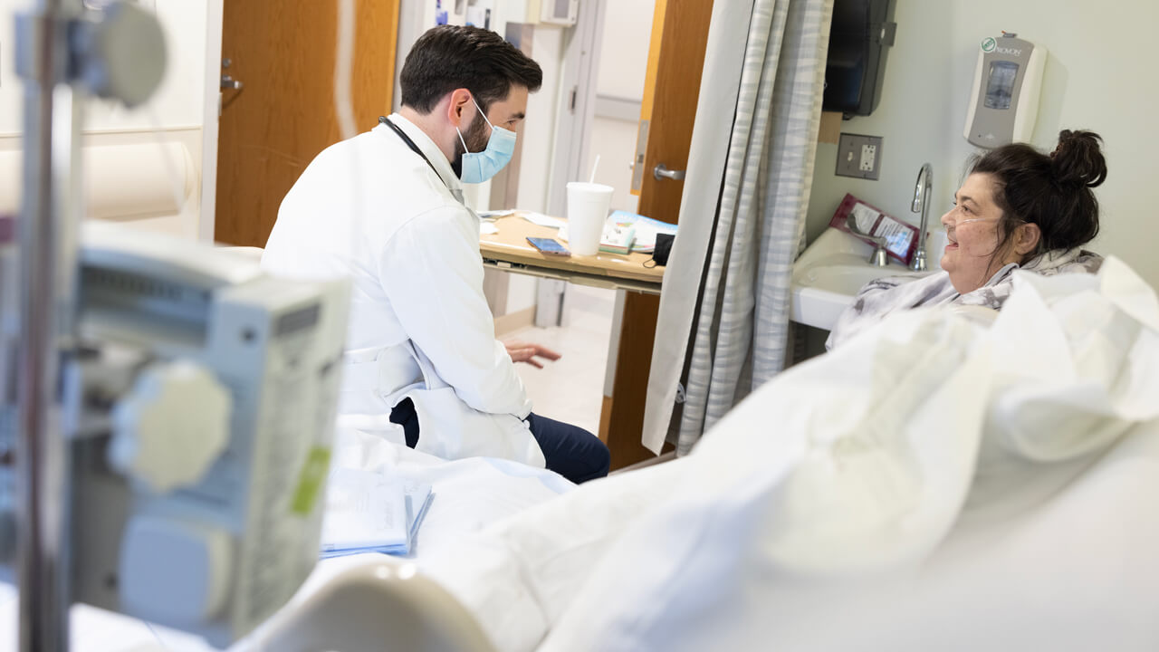 Doctor discusses with his patient.